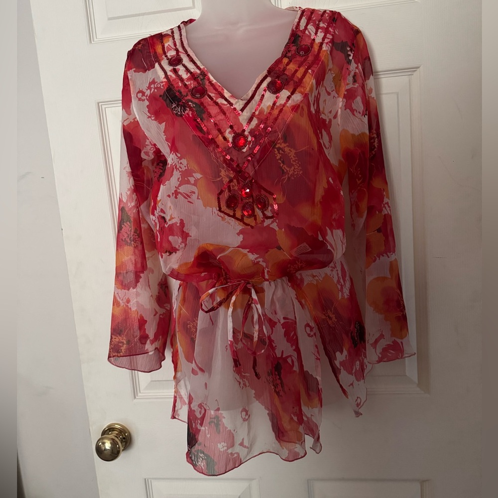 Beautiful swimsuit cover up or tunic.